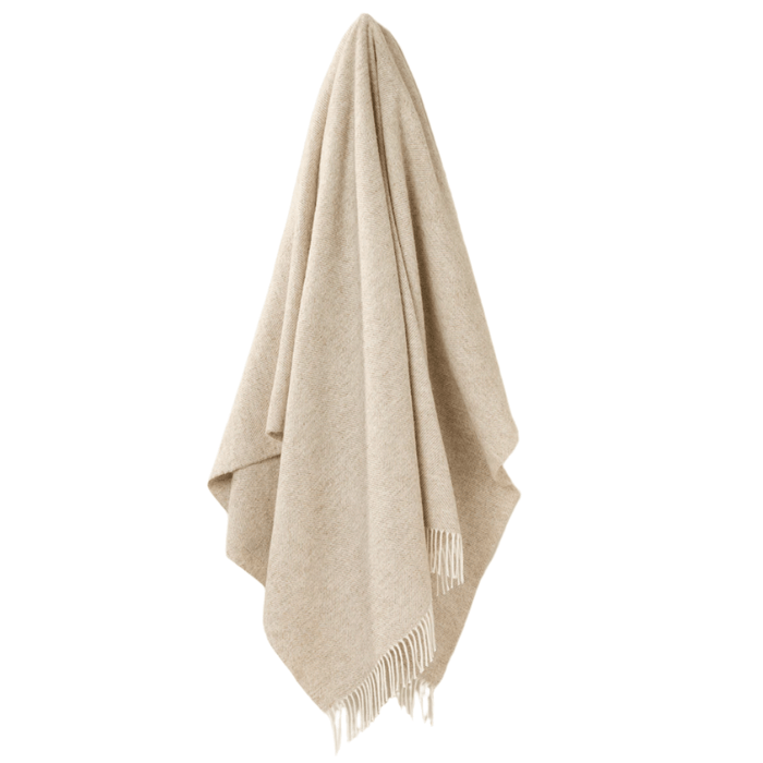 Natural Shetland herringbone wool throw hanging to show soft drape and cream fringed edges