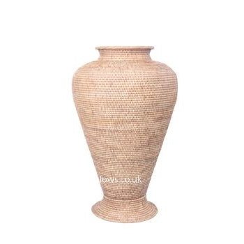 Front view of the Rattan Egypt Pot showing the intricate tight-weave texture of the natural rattan.