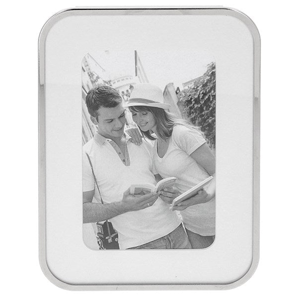 Elegant silver photo frame with curved corners featuring a black and white portrait of a couple.