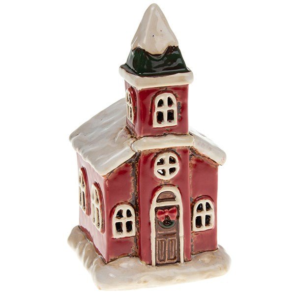 Red ceramic church tea-light holder with snow-dusted roof and steeple