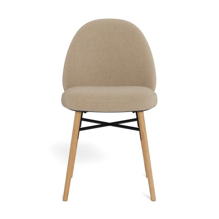 Front view of the Sophia dining chair showing the rounded backrest and neutral beige upholstery