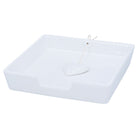 White stoneware napkin holder with a beaded edge and a ceramic heart weight on a cord.