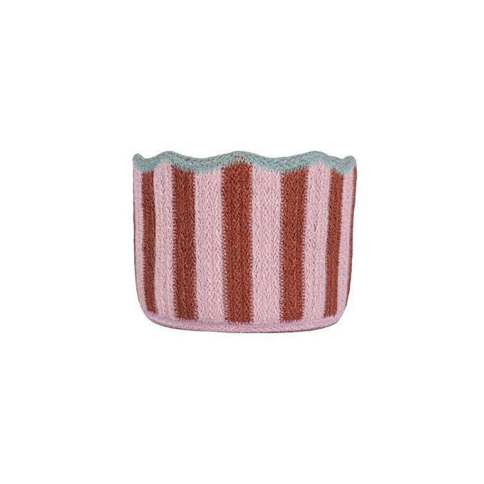 Handcrafted jute basket with vertical pink and burgundy stripes and a light blue scalloped top edge