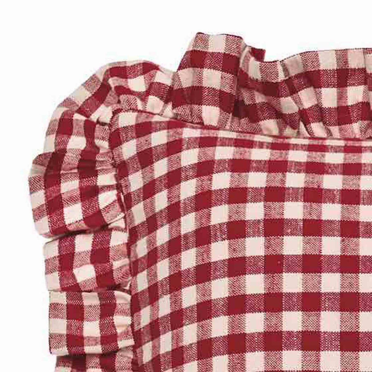 Close-up of the red gingham linen fabric showing the frayed edge detail and ruffle.