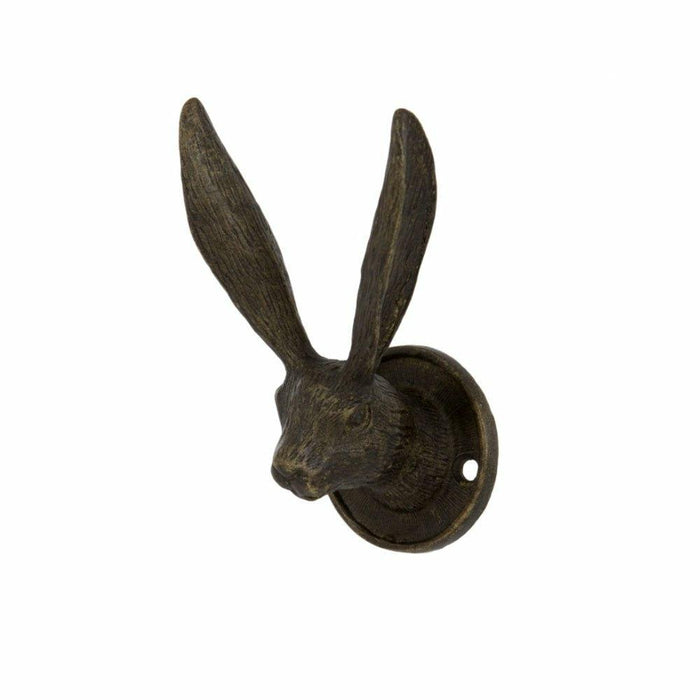 Rustic metal hare head wall hook with tall upright ears and a circular mounting base against a white background.