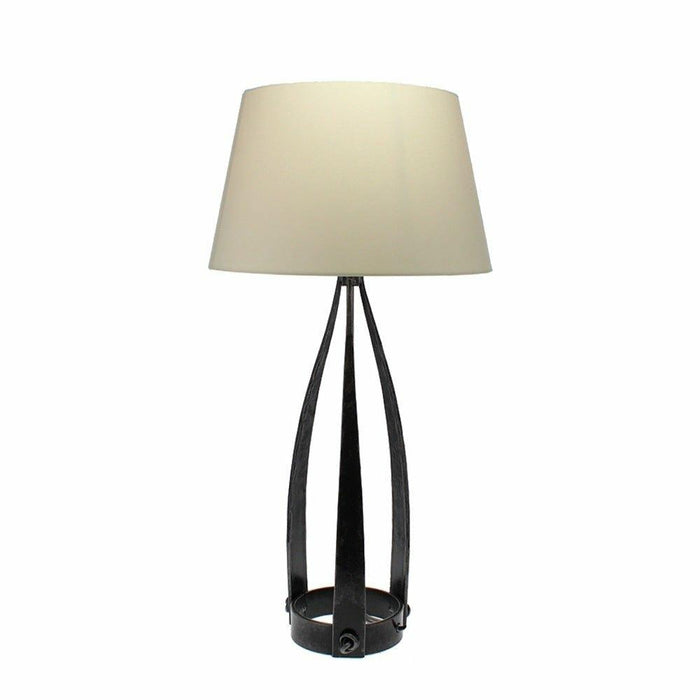 Large Jacobean Lamp with hand-forged iron base and cream fabric drum shade against a white background.