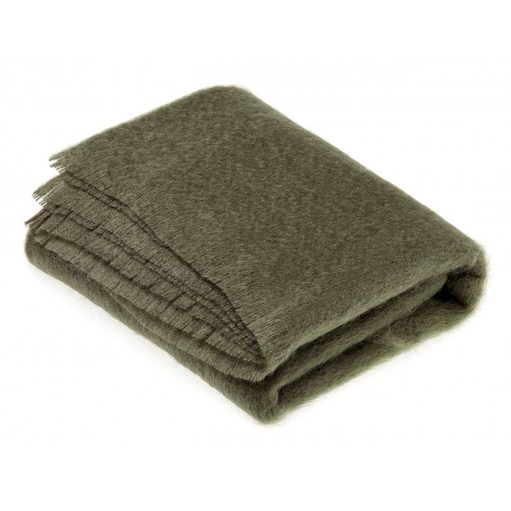 Folded moss green mohair throw with a textured surface and visible fringed edge against a white background.