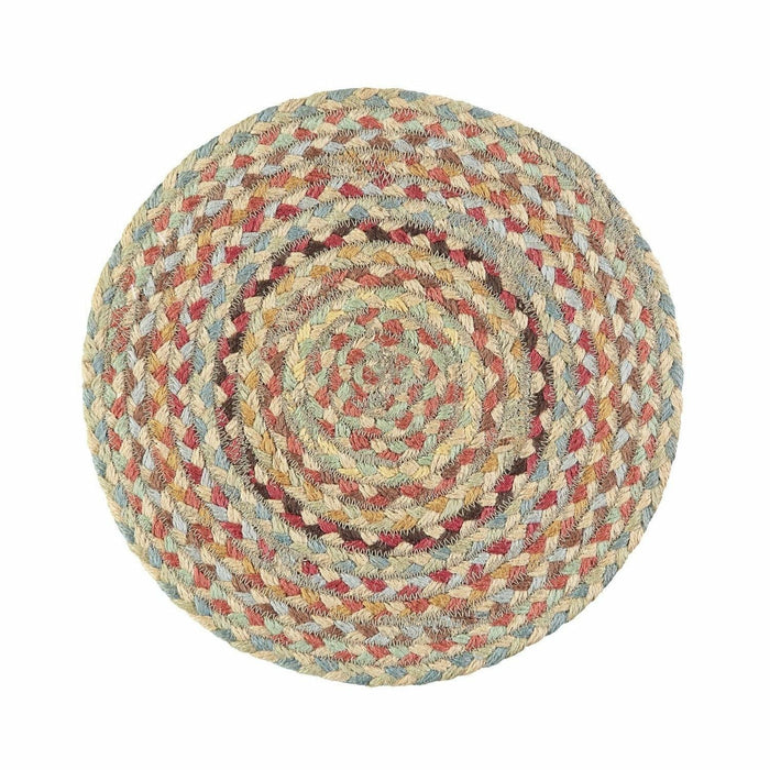 Circular braided jute placemat featuring a spiral weave of natural, red, blue, and yellow tones.