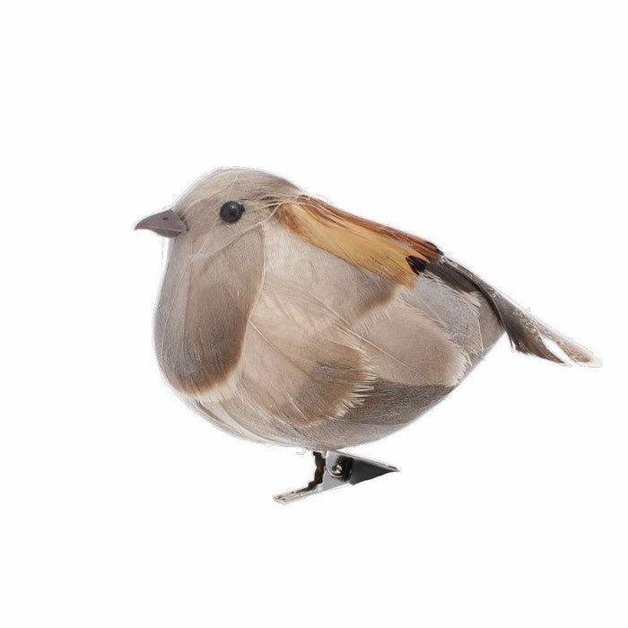 Side profile of a faux partridge decoration with soft grey and brown feathers