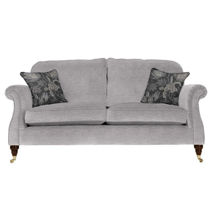 Westbury 2 seat sofa in light grey fabric with dark wood castor feet and patterned scatter cushions