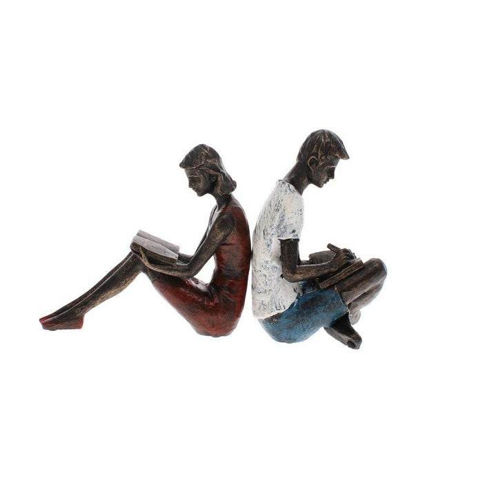 Side view of Young Couple Bookends showing a woman in a red dress reading and a man in a white shirt writing